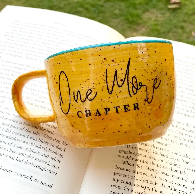 Designer double-wall espresso cups-One more chapter wobbly mug in yellow. These mugs are hand built so each mug will be different in its crookedness and wobbliness. No two are the same.